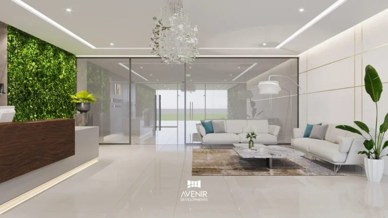 Apartment lobby interior with a glass partition, white seating and a planted wall