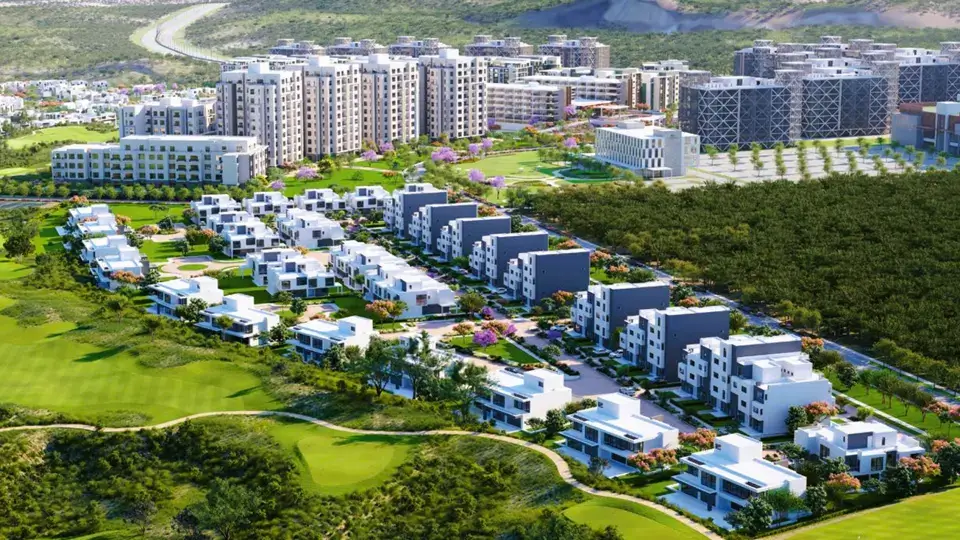 Aerial visualisation of Eighteen with villa clusters, apartment buildings and the golf course